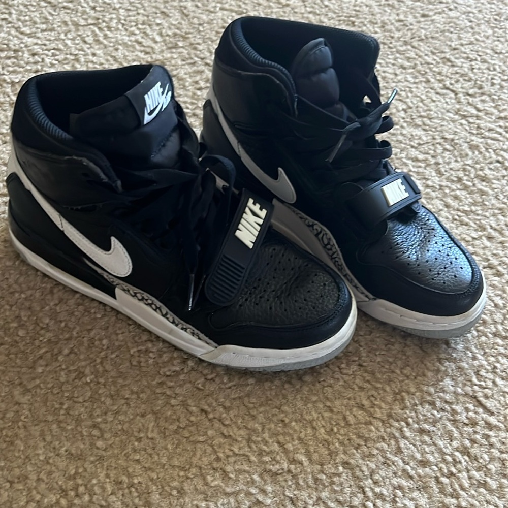 Black and white Nike high tops